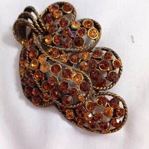 Kramer of New York vintage goldtone brooch with sparkling brown & gold rhineston